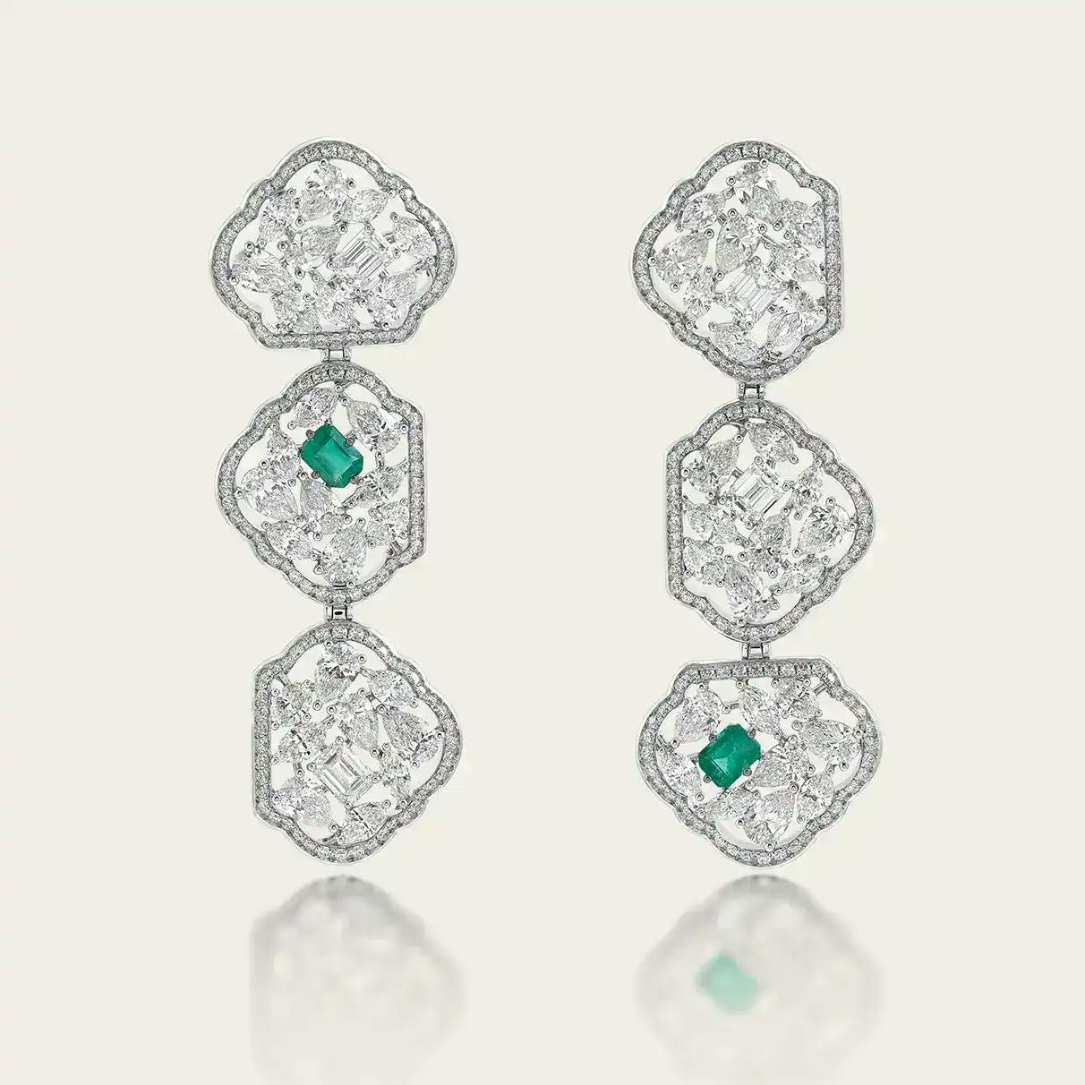 18K recycled white gold earrings with marquise, oval, round, pear and princess-cut white diamonds, Zambian emeralds.