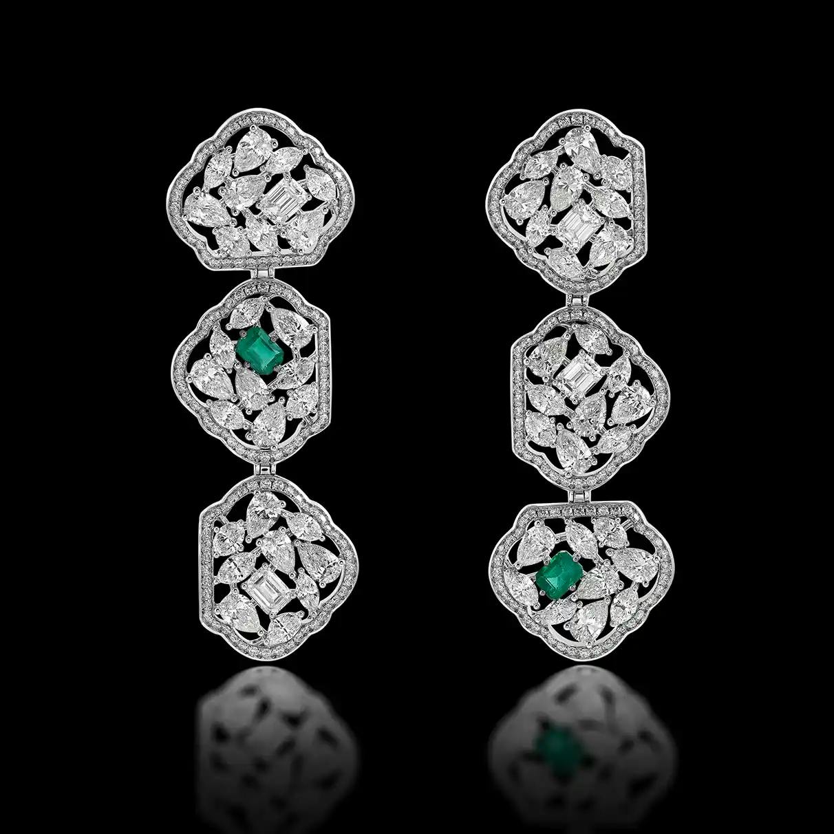 18K recycled white gold earrings with marquise, oval, round, pear and princess-cut white diamonds, Zambian emeralds.