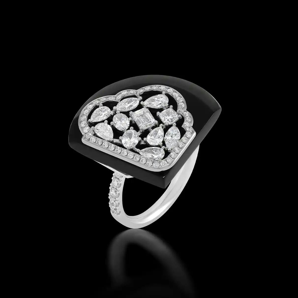 18K recycled white gold ring with special-cut black onyx, marquise, oval, round, pear and emerald-cut white diamonds.
